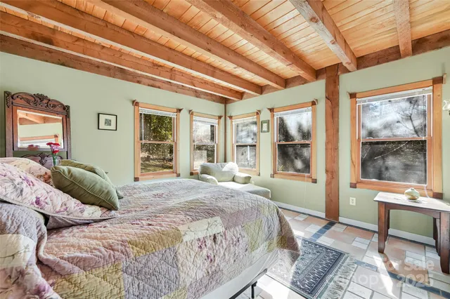 a view of a shop with a table and chairs