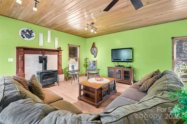 a bedroom with furniture and a chandelier