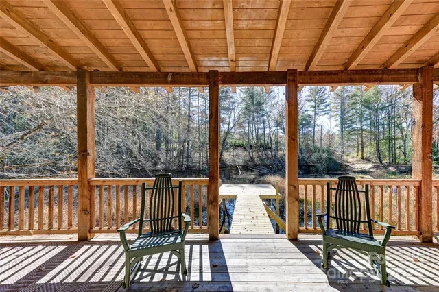 a view of a patio with wooden floor