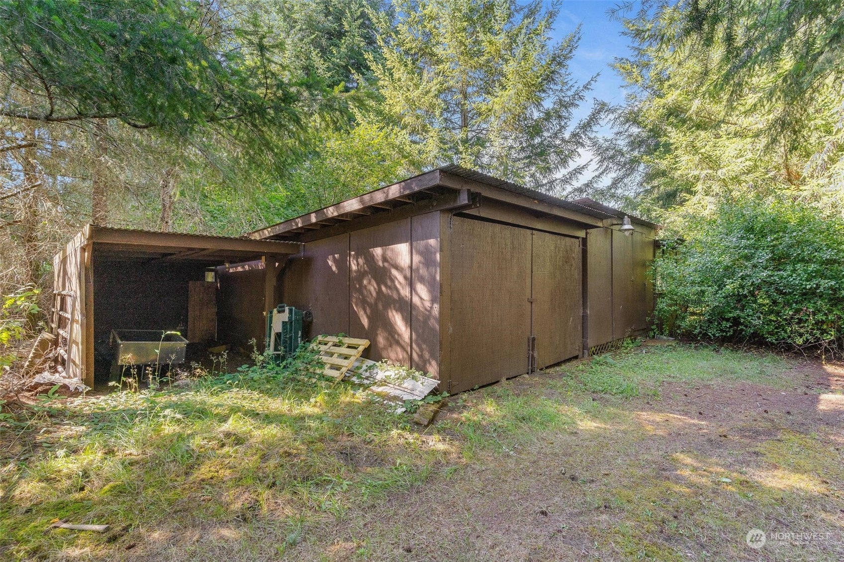 13223 Vail Cut Off Road Southeast Rainier, WA 98576 - Photo 29 of 32 a backyard of a house with lots of green space