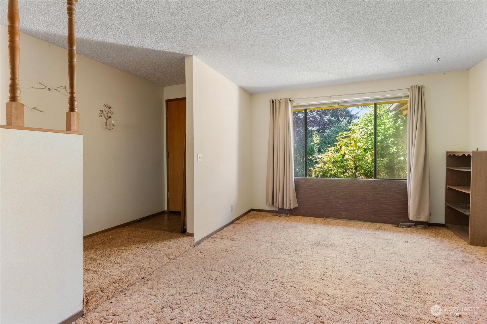 13223 Vail Cut Off Road Southeast Rainier, WA 98576 - Photo 4 of 32 an empty room with windows