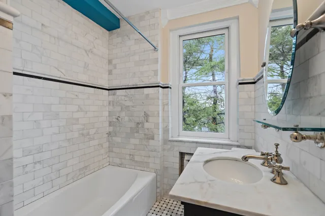 a bathroom with a sink and a bathtub