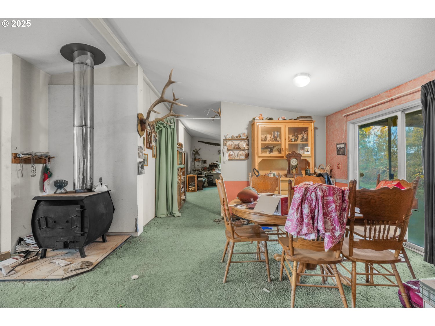19807 Highway 211 Colton, OR 97017 - Photo 6 of 22 a view of a dining room with furniture window and outside view