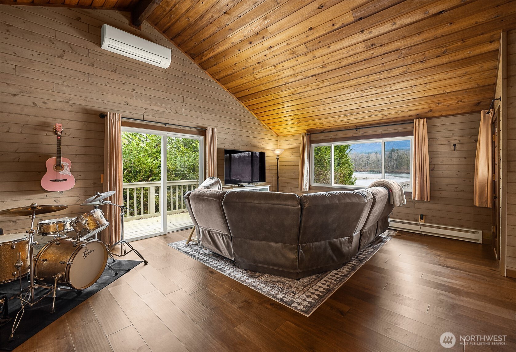 1122 Dyer Road Sultan, WA 98294 - Photo 20 of 40 a living room with furniture and a flat screen tv