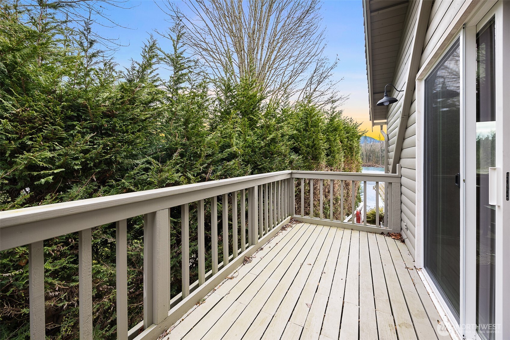 1122 Dyer Road Sultan, WA 98294 - Photo 30 of 40 a balcony with wooden floor and fence