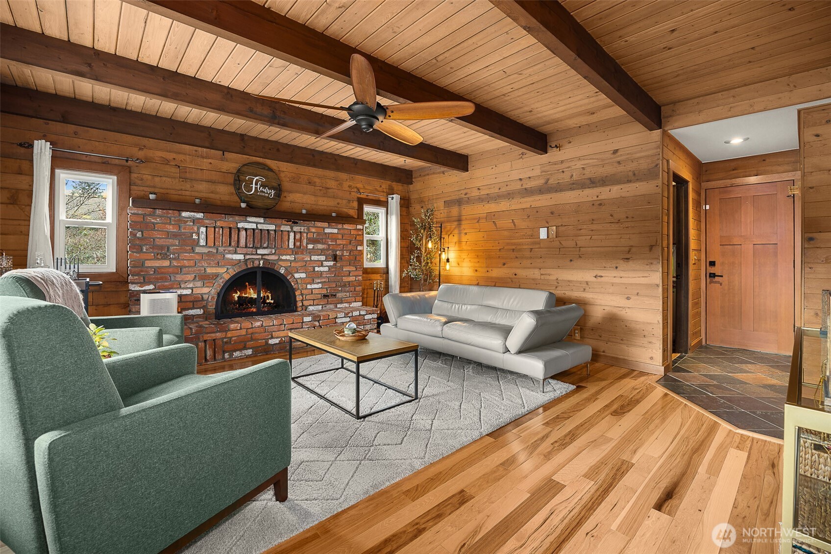 1122 Dyer Road Sultan, WA 98294 - Photo 9 of 40 a living room with furniture and a fireplace