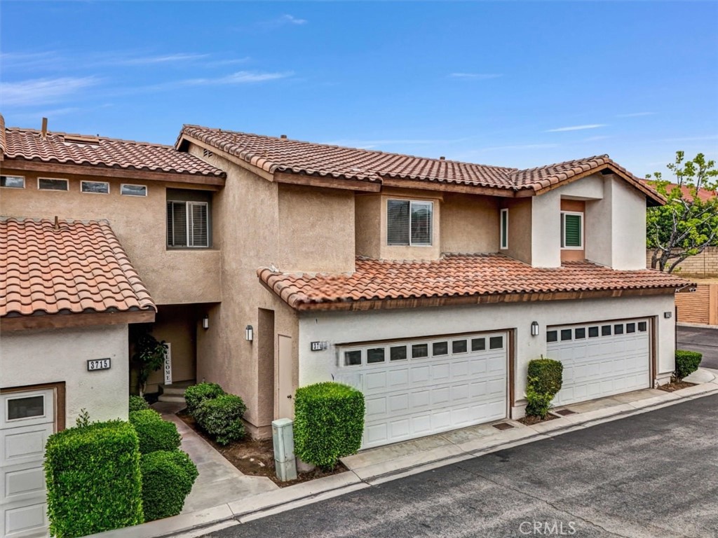 3709 Ave Veracruz Riverside, CA 92503 - Photo 1 of 1 a front view of a house with a garage