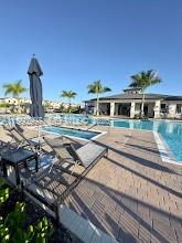 12773 Southwest 234th Terrace Homestead, FL 33032 - Photo 2 of 11 a view of a city with tall buildings