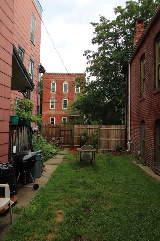 30 3rd Street Montague, MA 01376 - Photo 3 of 15 a view of backyard with a table and chairs and potted plants