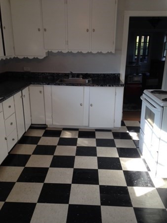 30 3rd Street Montague, MA 01376 - Photo 5 of 15 a black and white checkered floor with a black white checkered floor