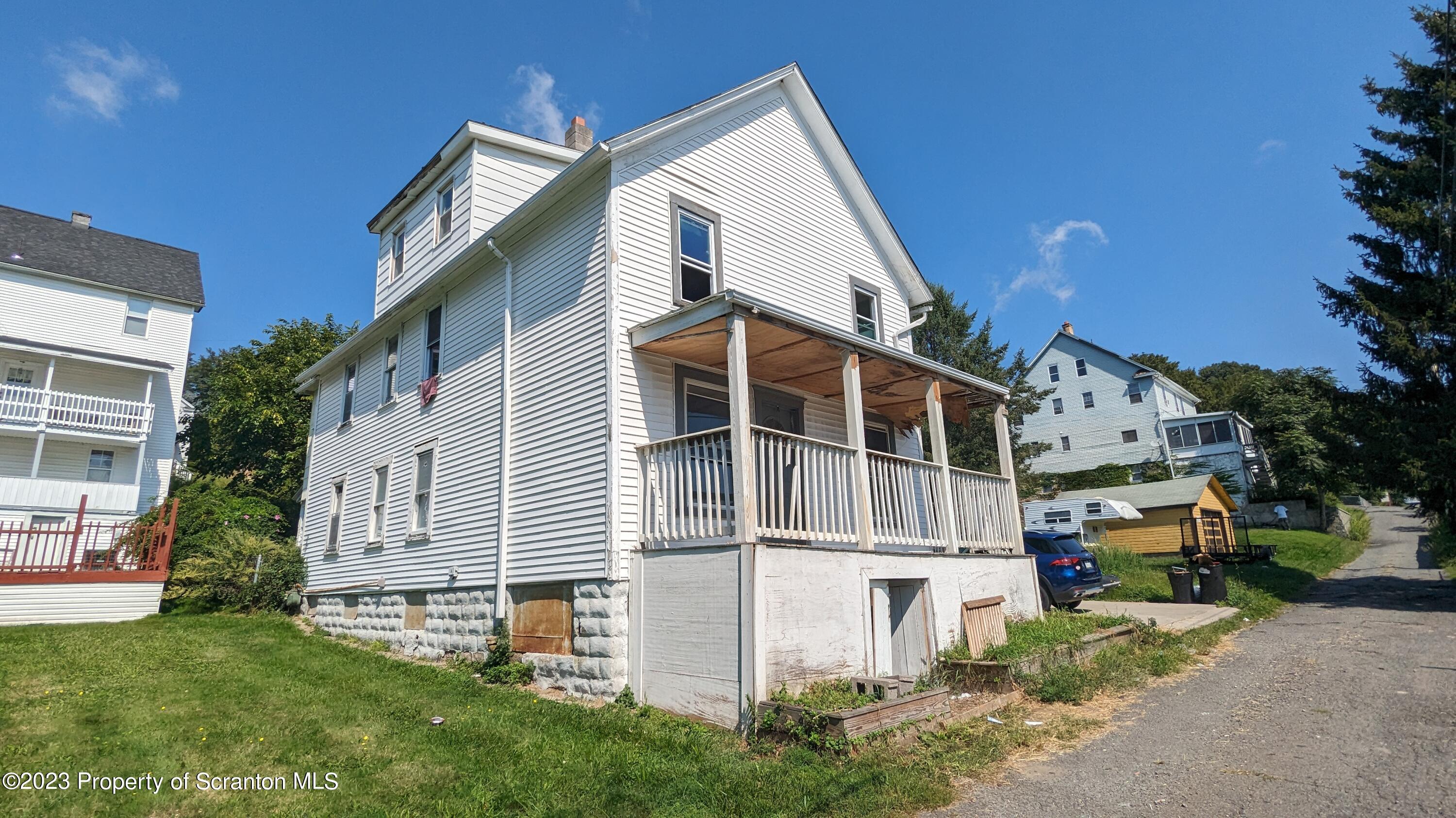 357 Hughes Court Scranton, PA 18504 - Photo 1 of 16 a view of a house with a yard