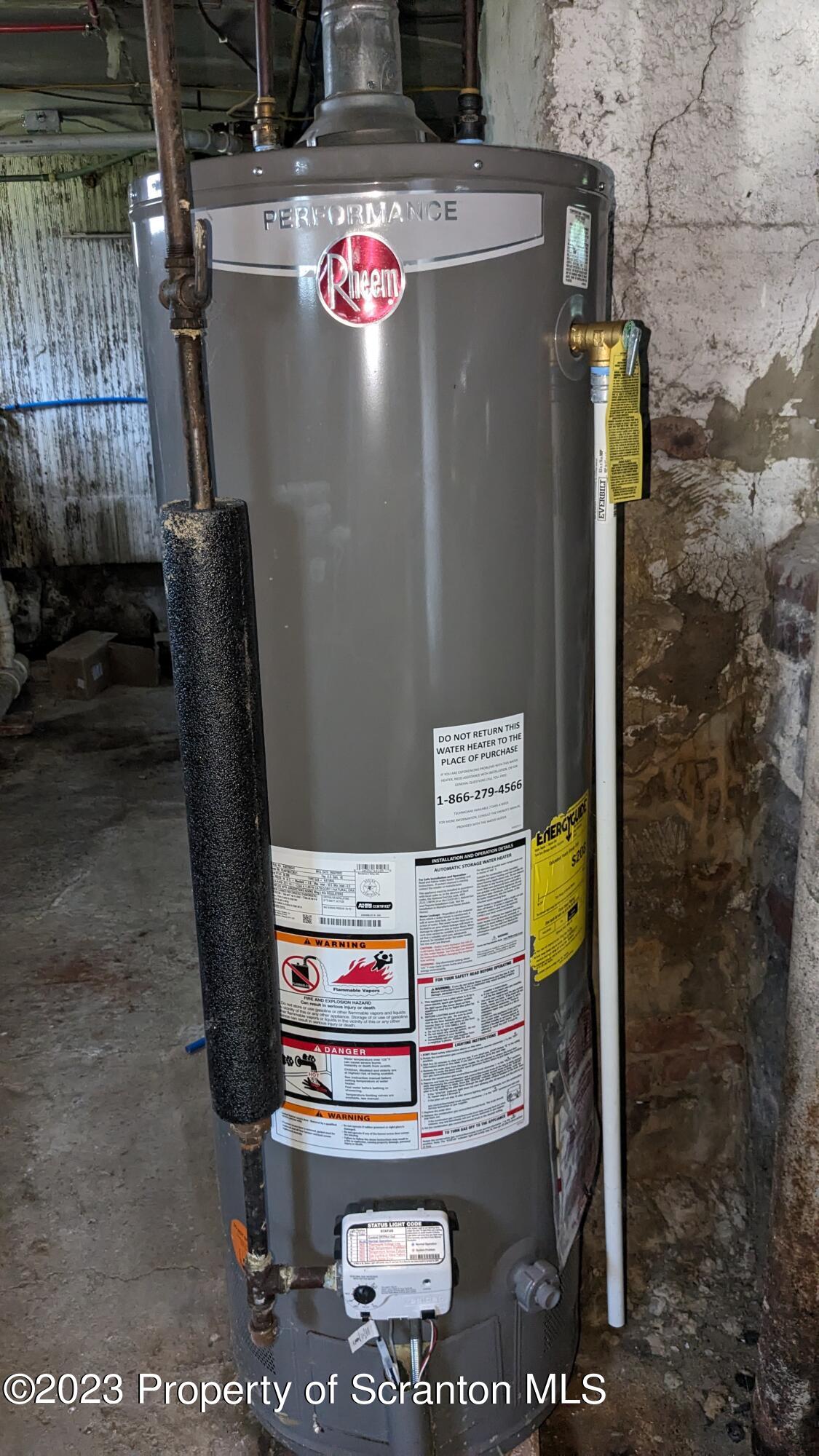 357 Hughes Court Scranton, PA 18504 - Photo 14 of 16 a utility room with dryer and washer