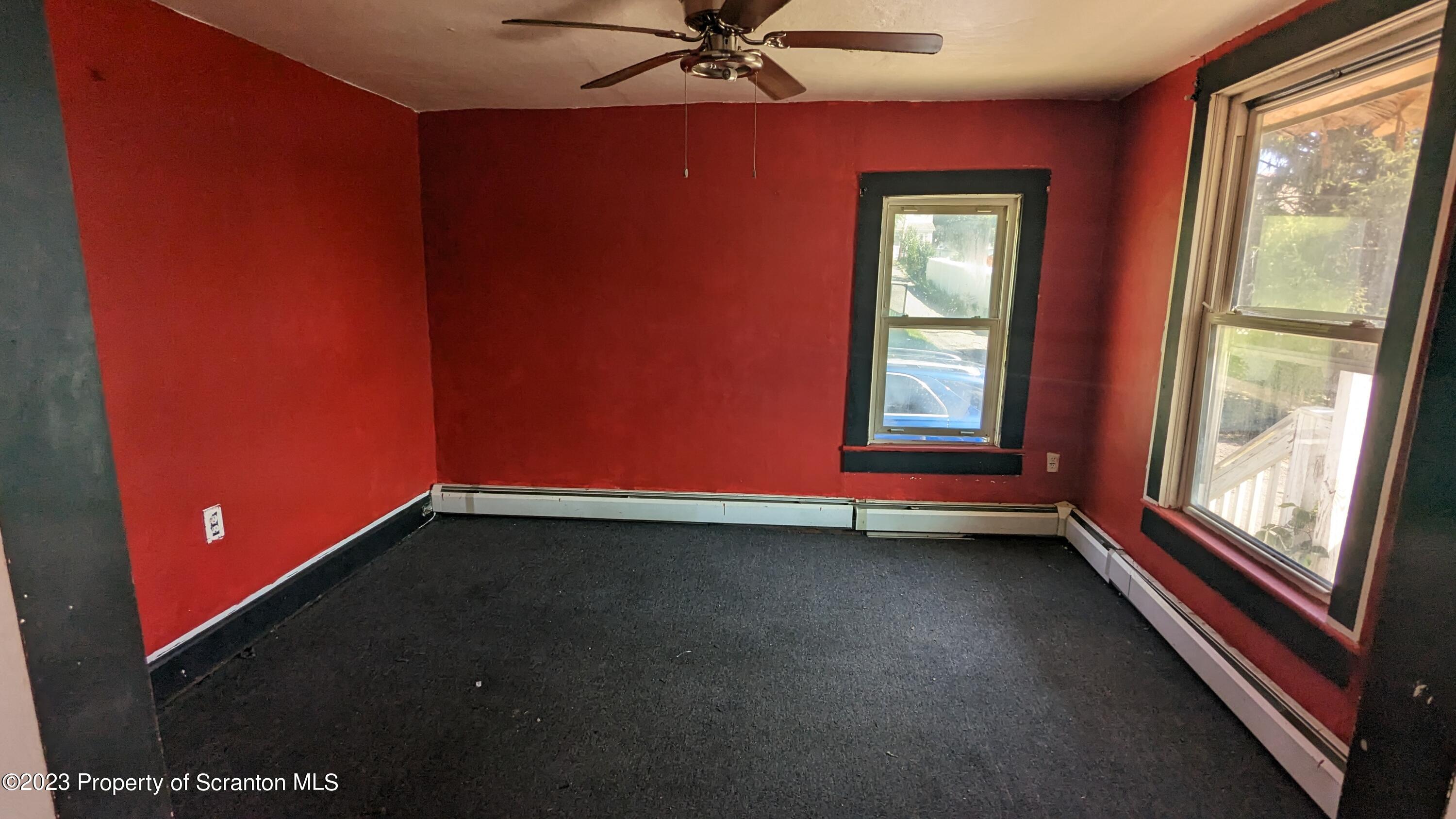 357 Hughes Court Scranton, PA 18504 - Photo 3 of 16 a view of an empty room and window