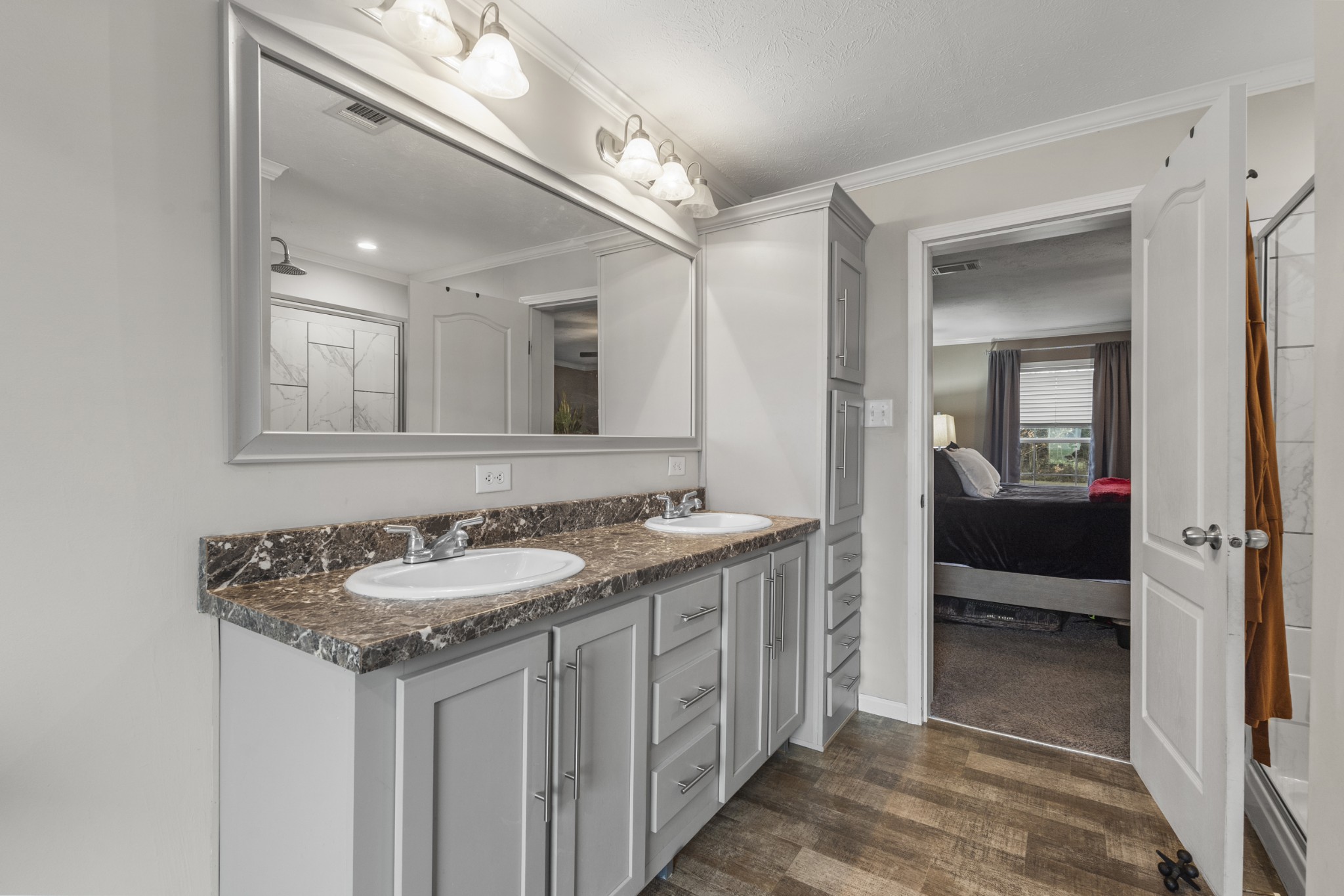 60 Edgewood Road McEwen, TN 37101 - Photo 29 of 56 a en suite bathroom with a sink and a mirror