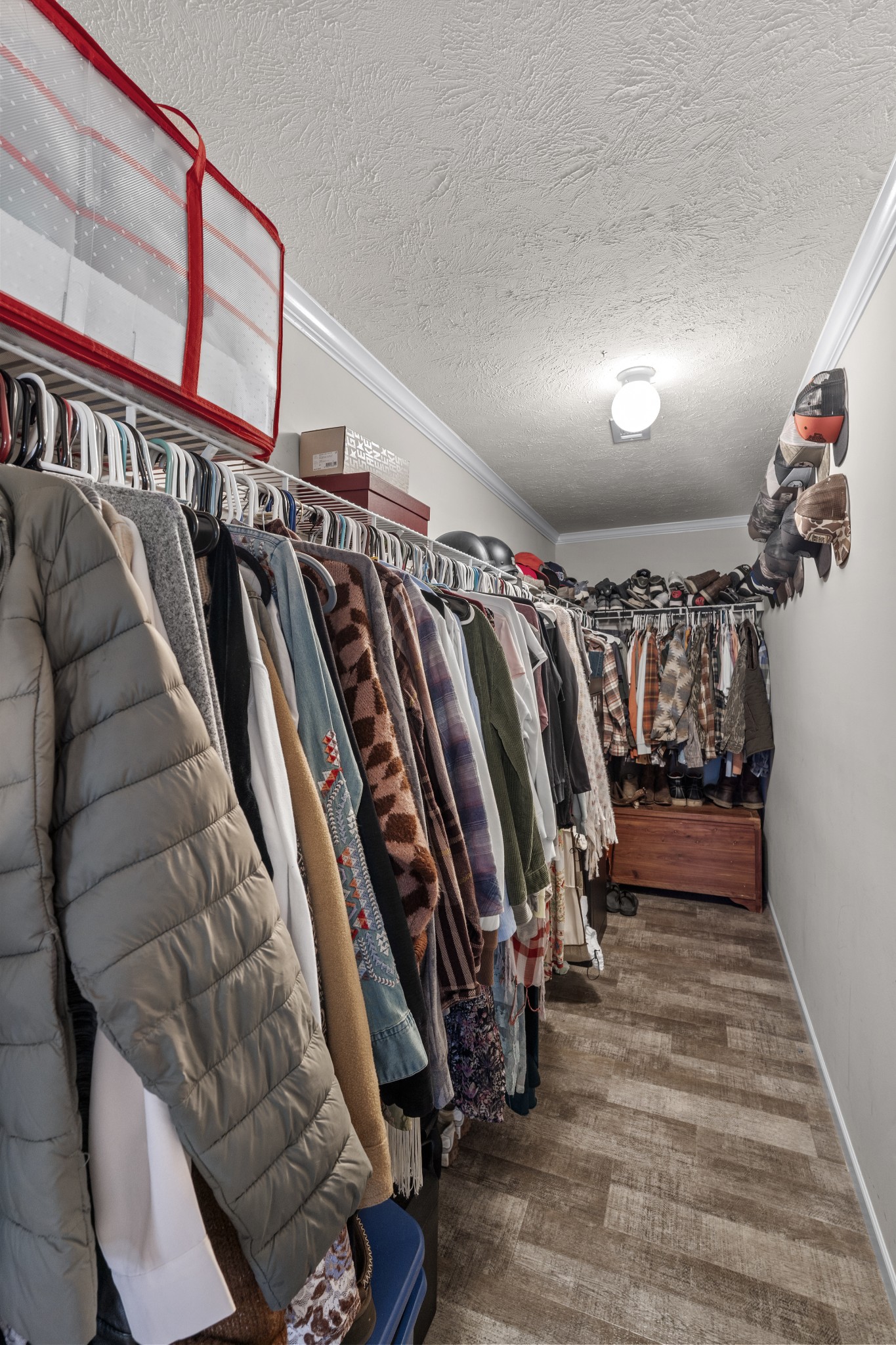 60 Edgewood Road McEwen, TN 37101 - Photo 32 of 56 a view of walk in closet with clothes and shoes