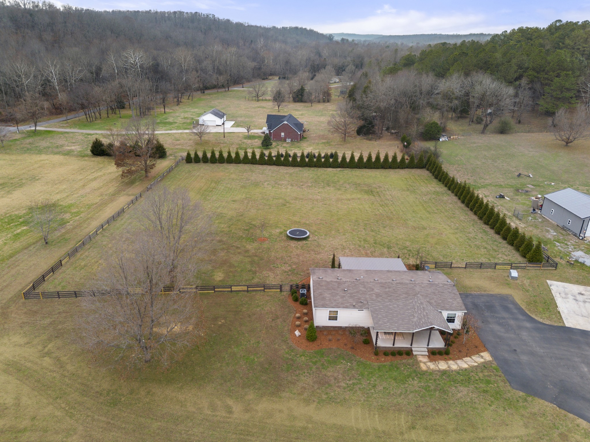 60 Edgewood Road McEwen, TN 37101 - Photo 56 of 56 a view of a lake with a mountain in the background
