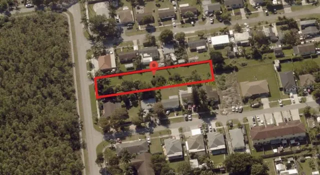 a view of a balcony with yard