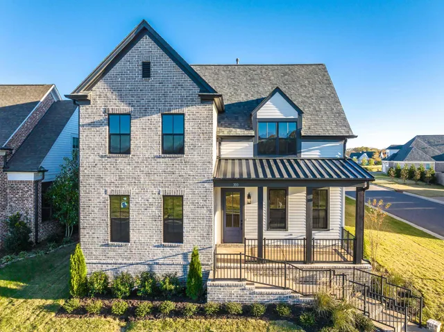 front view of a house with a porch