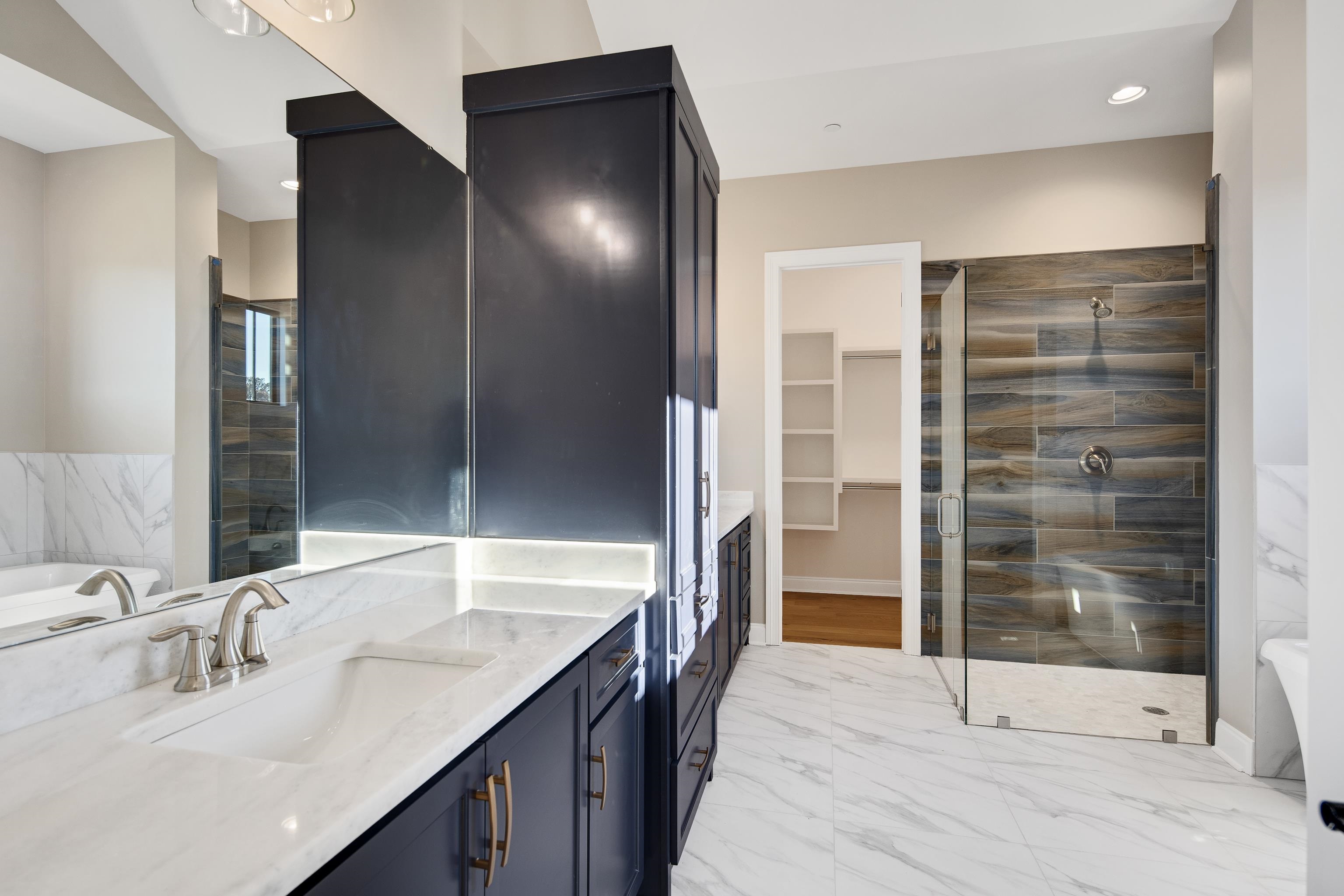 300 Mary Taylor Way Piperton, TN 38017 - Photo 19 of 36 Bathroom with vanity and plus walk in shower