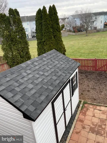 a view of a backyard and ocean