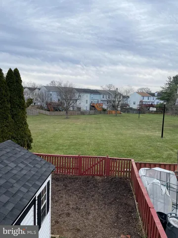 a view of a patio with a yard