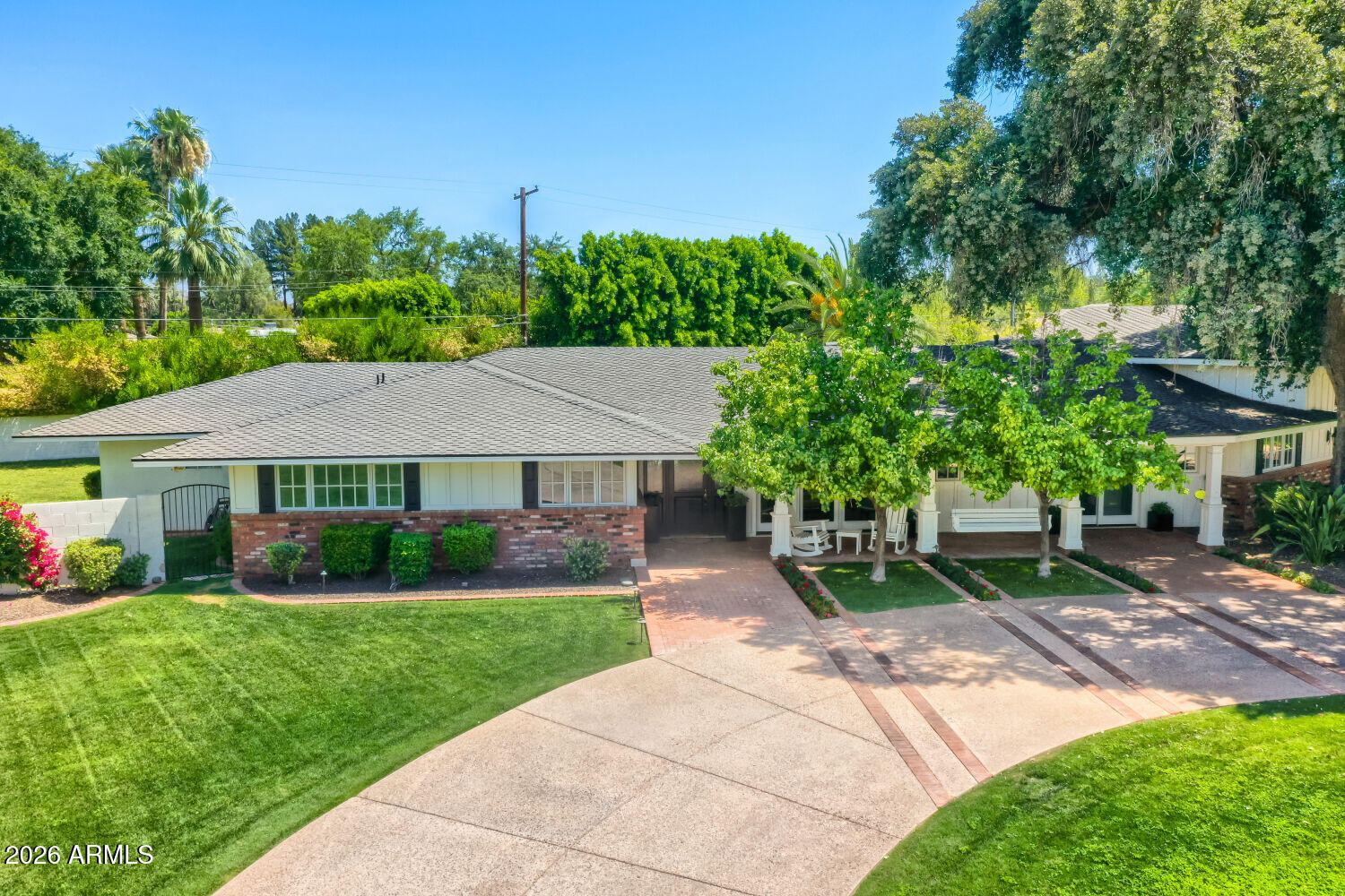 330 West Lawrence Road Phoenix, AZ 85013 - Photo 6 of 36 a view of a house with a yard