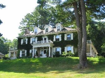 169 Jerusalem Road Tyringham, MA 01264 - Photo 1 of 2 a front view of a house with a garden