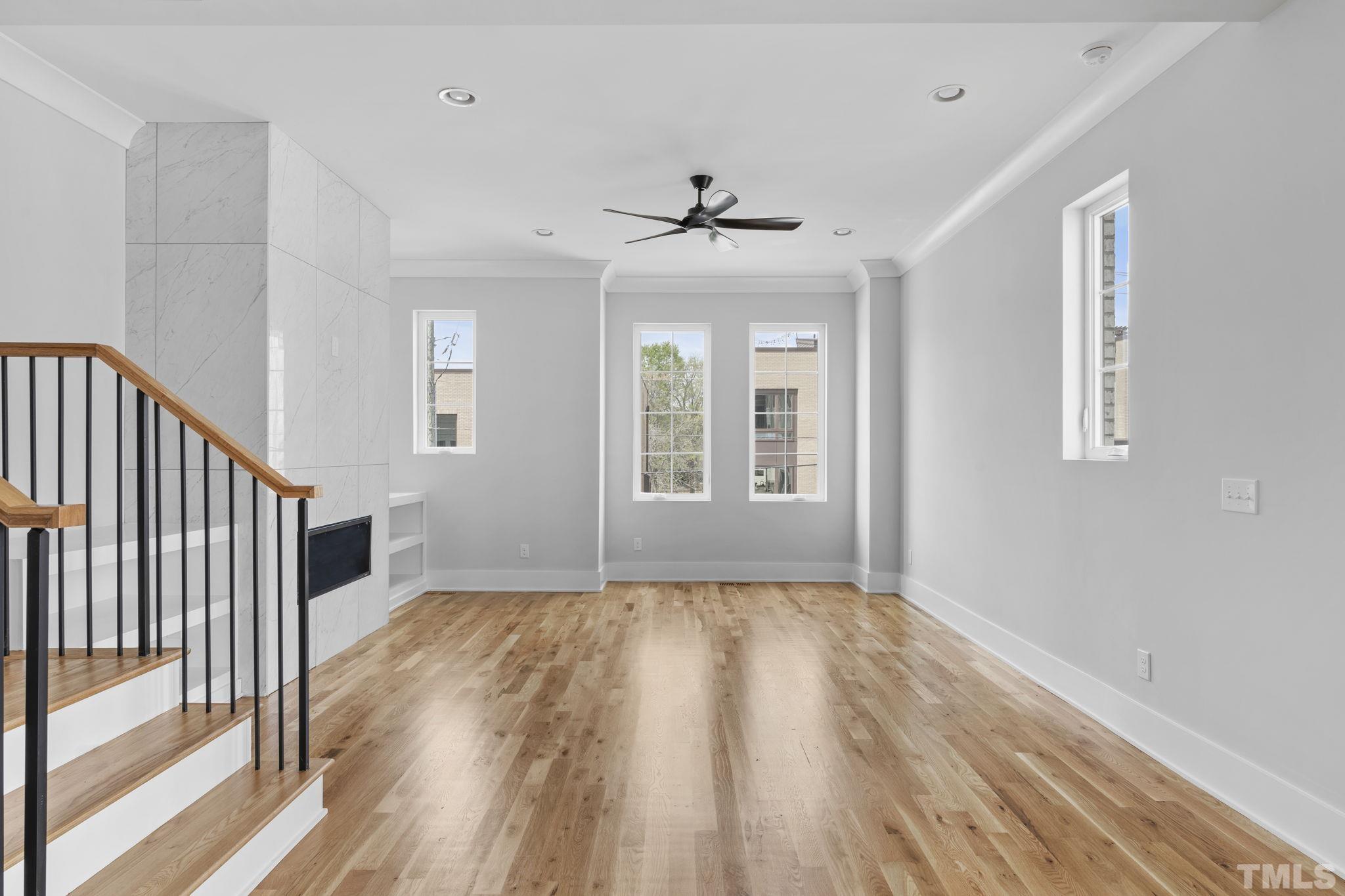 407 West Lenoir Street Raleigh, NC 27601 - Photo 11 of 42 wooden floor in an empty room with a window