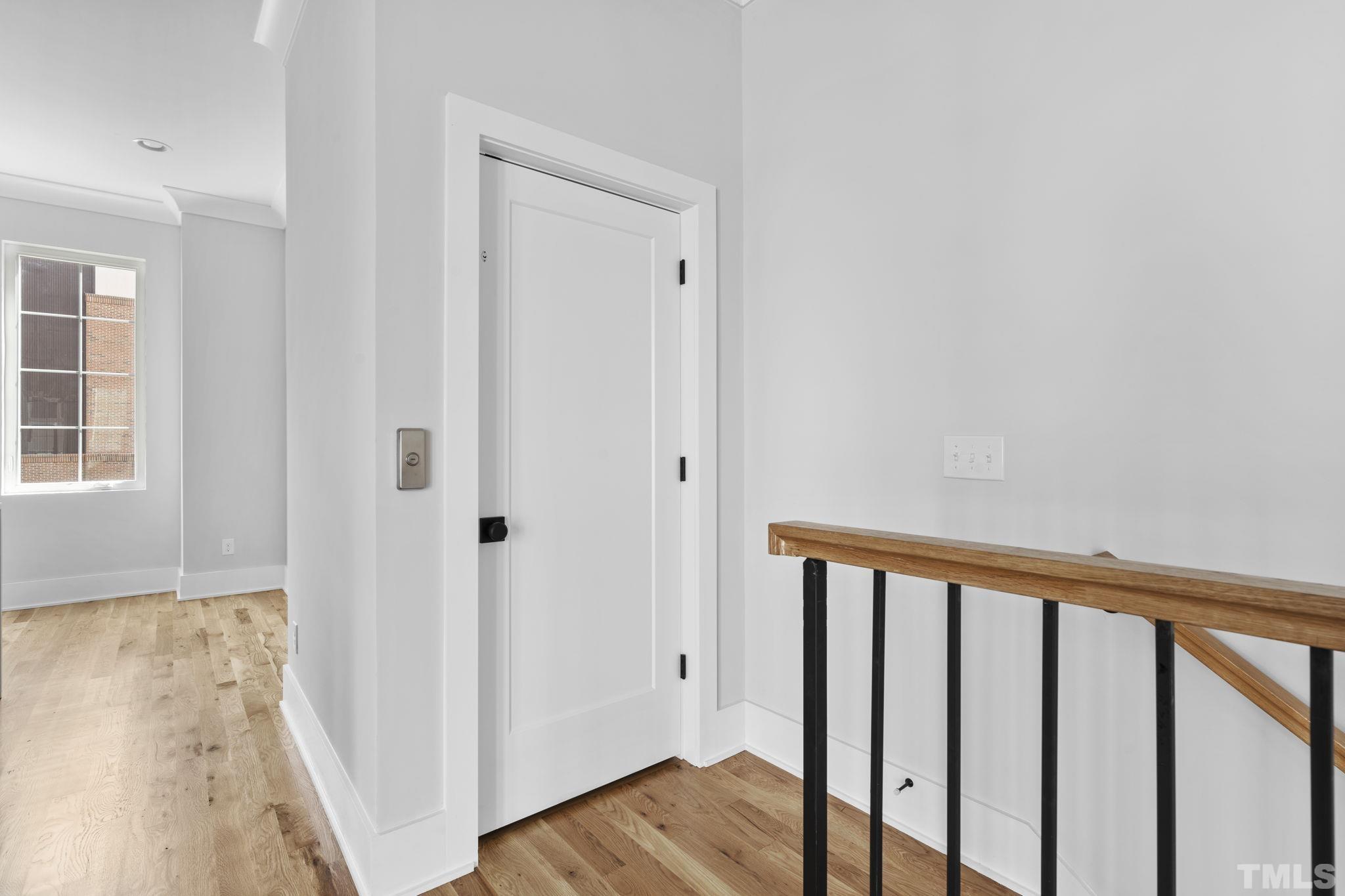 407 West Lenoir Street Raleigh, NC 27601 - Photo 24 of 42 a view of a hallway with wooden floor and entryway