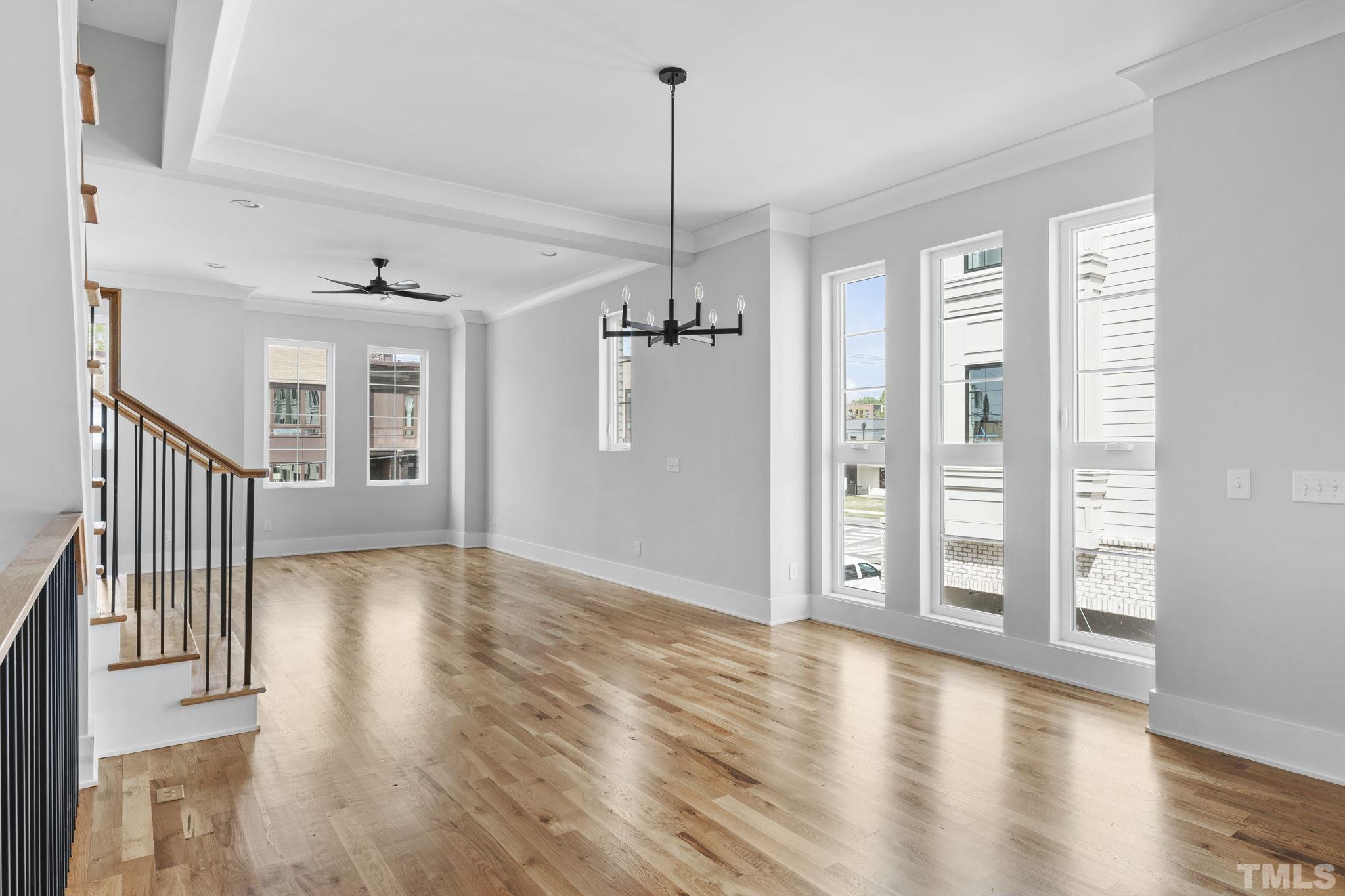 407 West Lenoir Street Raleigh, NC 27601 - Photo 26 of 42 a view of a hallway with wooden floor and windows