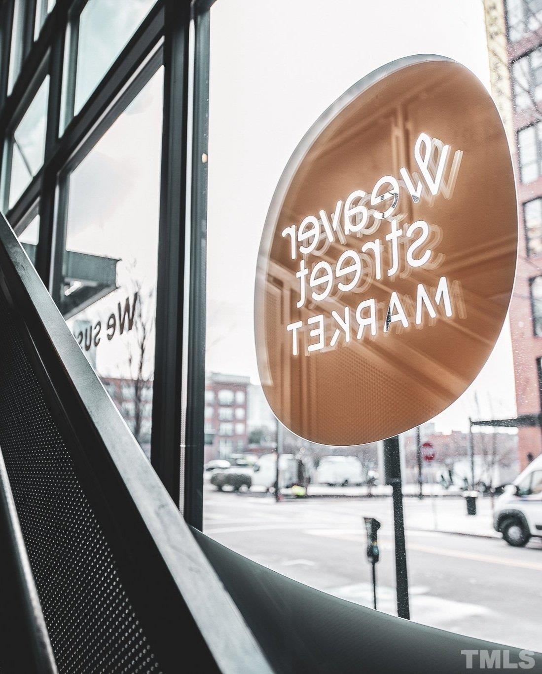 407 West Lenoir Street Raleigh, NC 27601 - Photo 40 of 42 a view of a living room and a floor to ceiling window