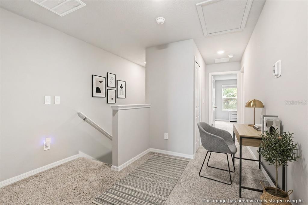 32502 Limitless Place Wesley Chapel, FL 33545 - Photo 23 of 67 a view of a livingroom with furniture and a window