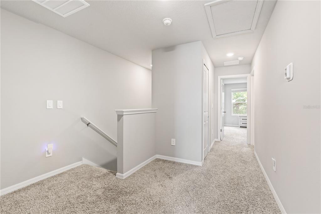 32502 Limitless Place Wesley Chapel, FL 33545 - Photo 24 of 67 a view of an empty room