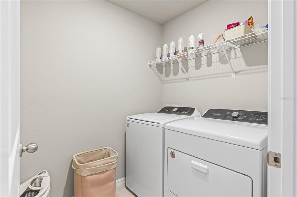 32502 Limitless Place Wesley Chapel, FL 33545 - Photo 36 of 67 a utility room with dryer and washer