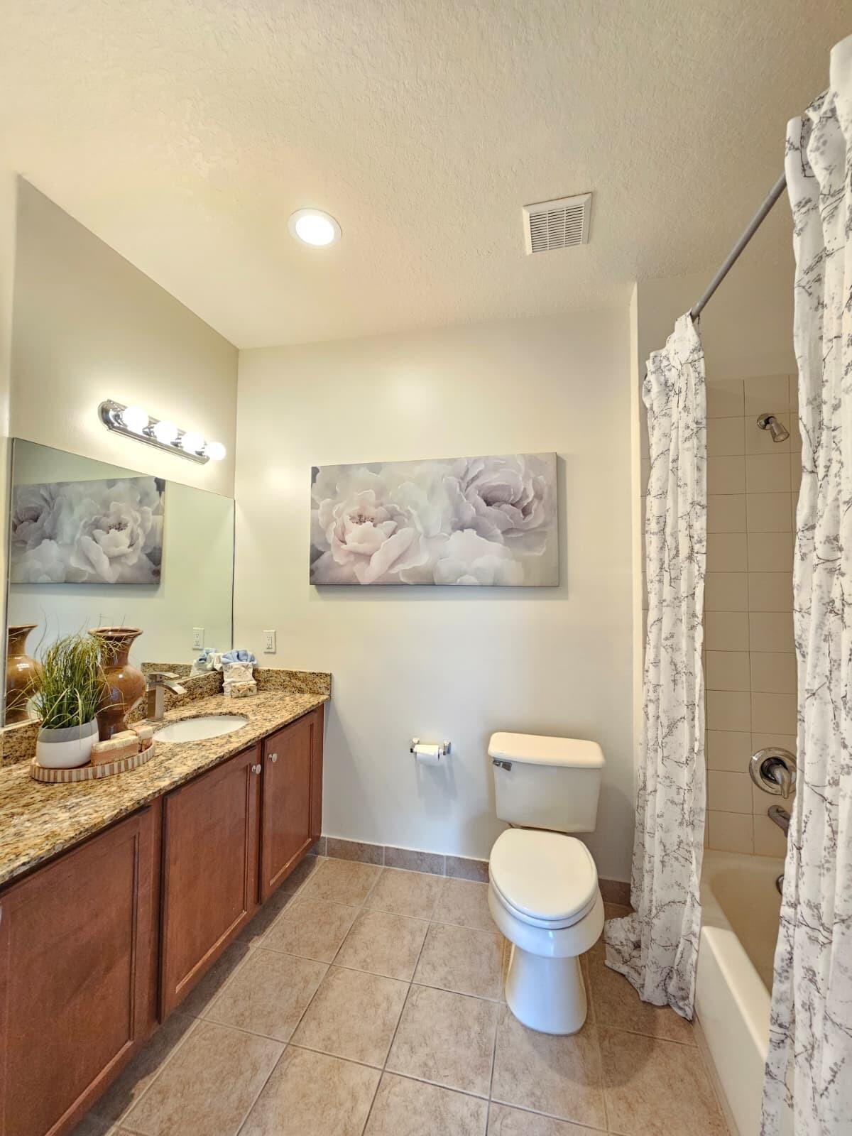 3022 Laurel Ridge Circle Riviera Beach, FL 33404 - Photo 2 of 7 Guest Bathroom 2