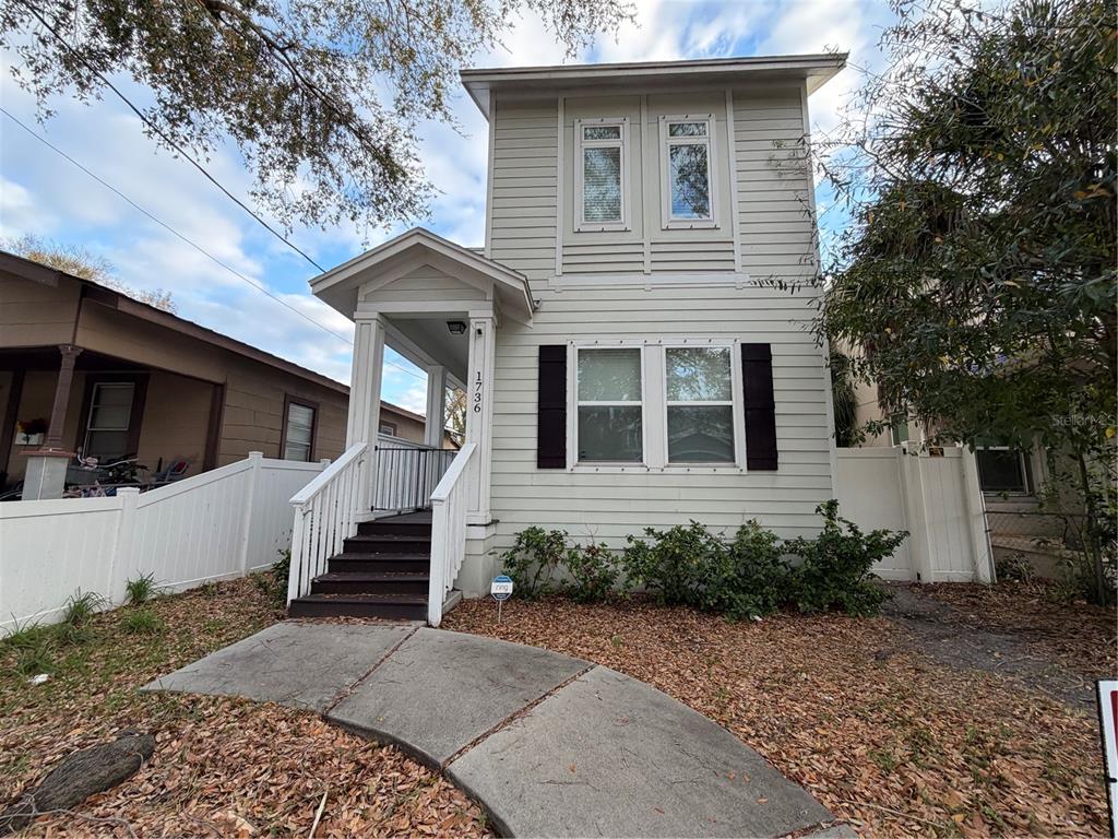 1736 West Walnut Street Tampa, FL 33607 - Photo 1 of 22 a front view of a house with a yard