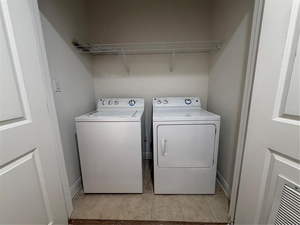 1736 West Walnut Street Tampa, FL 33607 - Photo 18 of 22 a utility room with dryer and washer