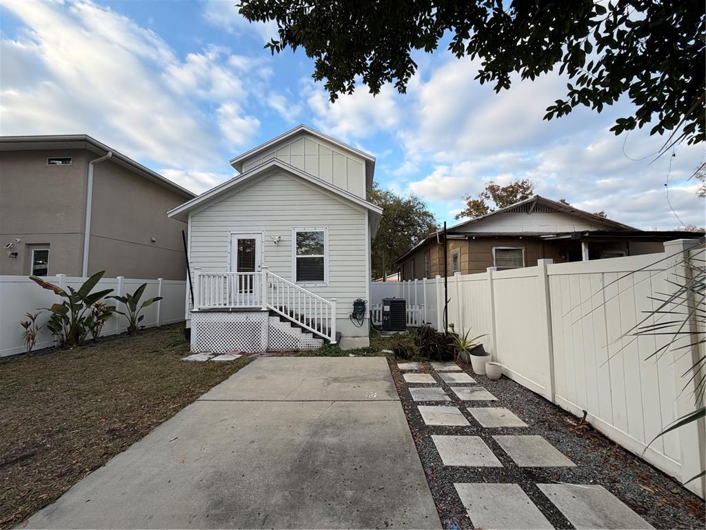 1736 West Walnut Street Tampa, FL 33607 - Photo 21 of 22 a patio with table and chairs