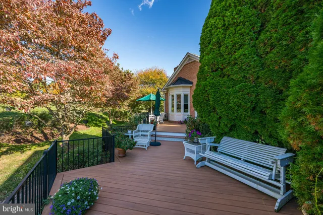 a view of a bench in wooden floor