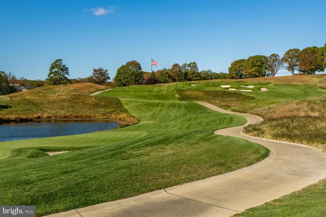a view of a golf course with a yard