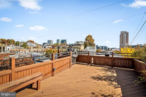a view of a balcony with city view