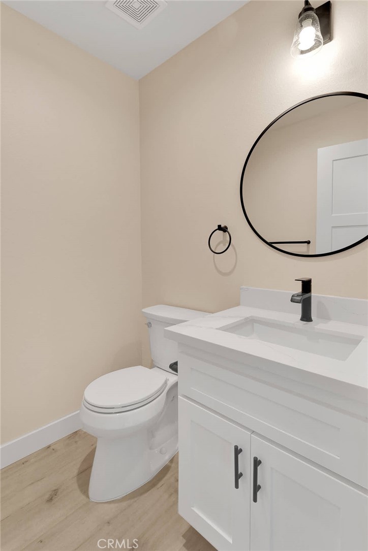 10647 Central Road Apple Valley, CA 92308 - Photo 12 of 27 a bathroom with a sink and mirror