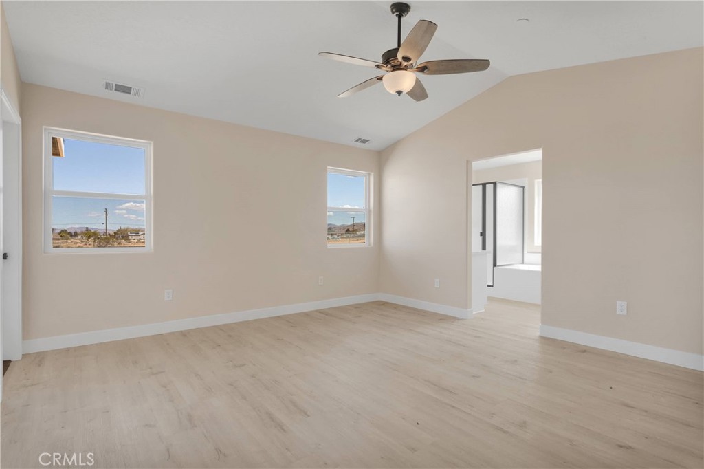 10647 Central Road Apple Valley, CA 92308 - Photo 13 of 27 a view of an empty room with a window