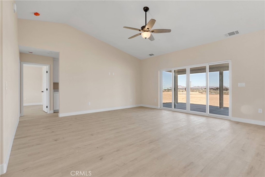 10647 Central Road Apple Valley, CA 92308 - Photo 9 of 27 a view of an empty room with a window