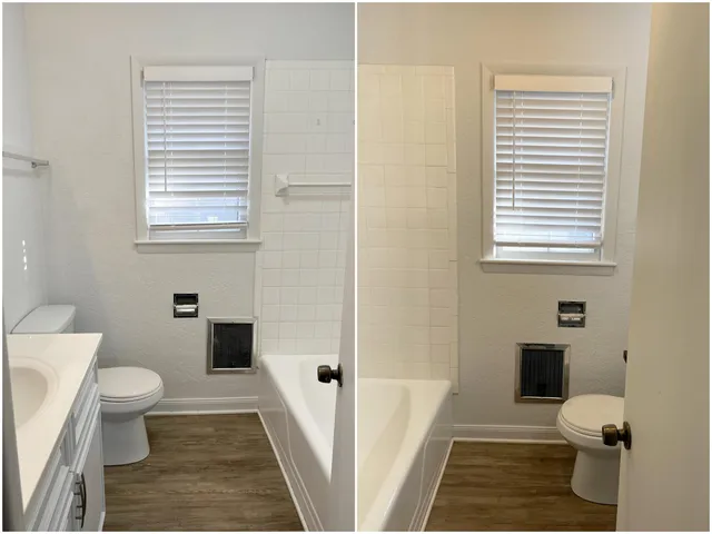 a bathroom with a toilet and a shower