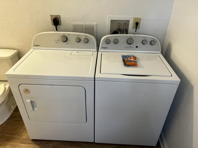a utility room with dryer and washer