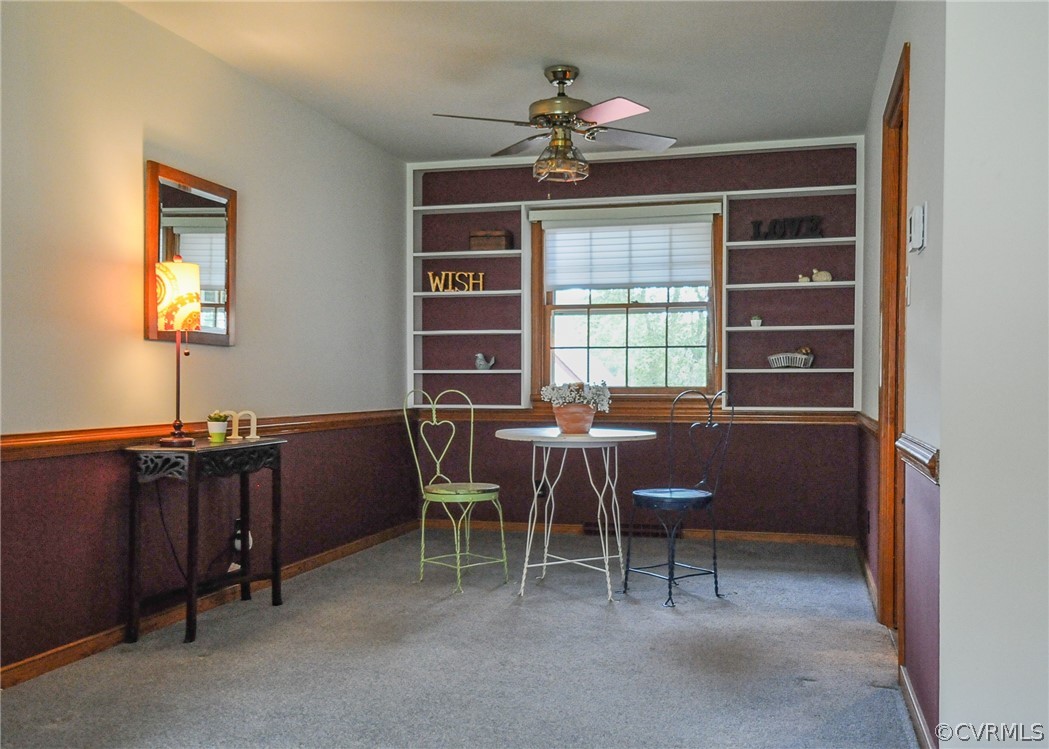 311 Treva Road Sandston, VA 23150 - Photo 16 of 40 DINING AREA ON MAIN LEVEL HAS SOLID CROWN, HARDWOO