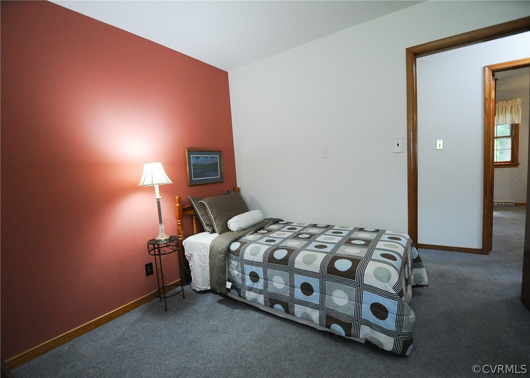 311 Treva Road Sandston, VA 23150 - Photo 23 of 40 BEDROOM 32 OFFERS A NICE SIZE CLOSET AND HARDWOODS