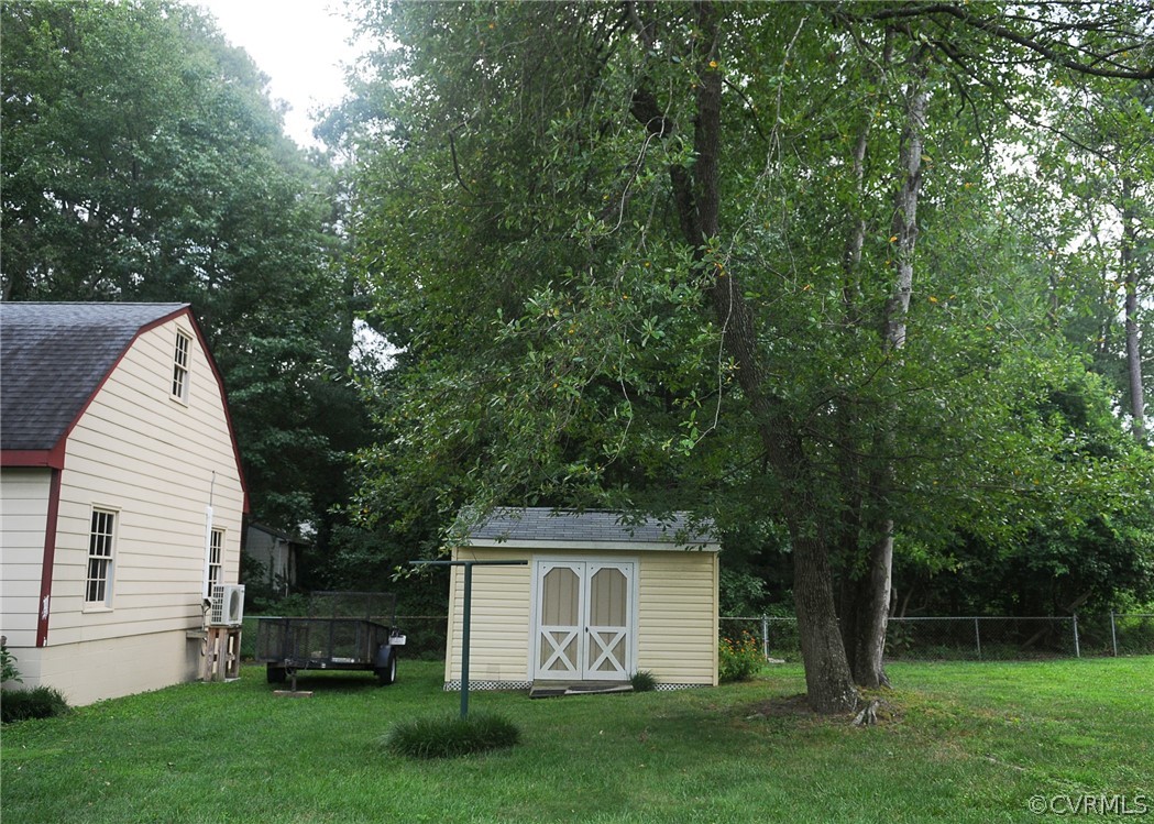 311 Treva Road Sandston, VA 23150 - Photo 7 of 40 THERE IS A SHE-SHED BEHIND THE MAN CAVE TOO!