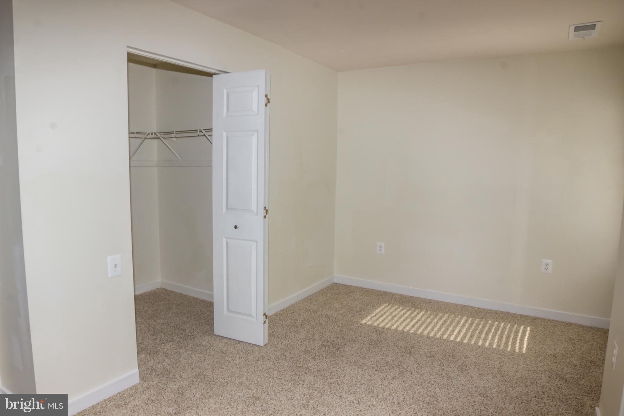 325 Pleasanton Road, Unit B22 Westminster, MD 21157 - Photo 19 of 26 Bedroom #2 has a walk in closet and balcony!